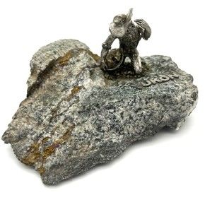 YUKON Creation Yukonnaise Man Panning for Gold Statue on a Slab of Rock